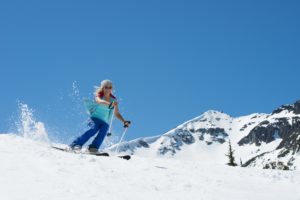 female skiing in the spring