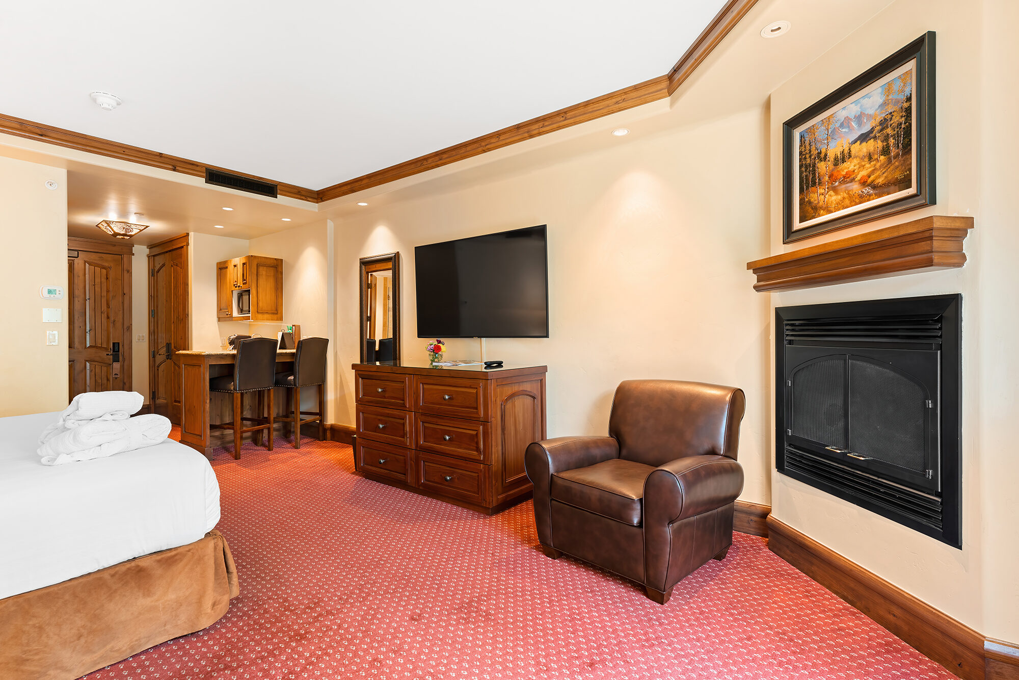 mountain view room with fireplace, kitchenette, king bed Tivoli Lodge Vail Colorado
