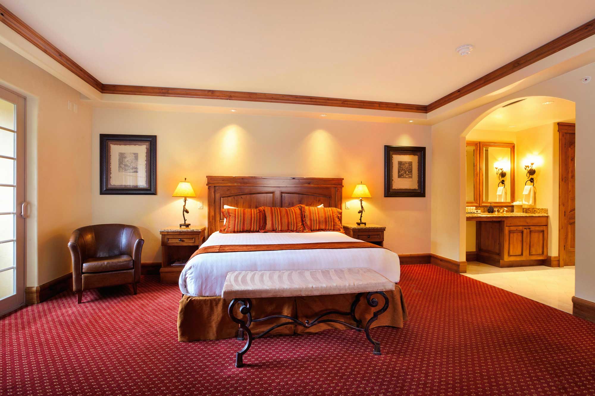 large bedroom and spacious bathroom in Seibert suite Tivoli Lodge Vail Colorado