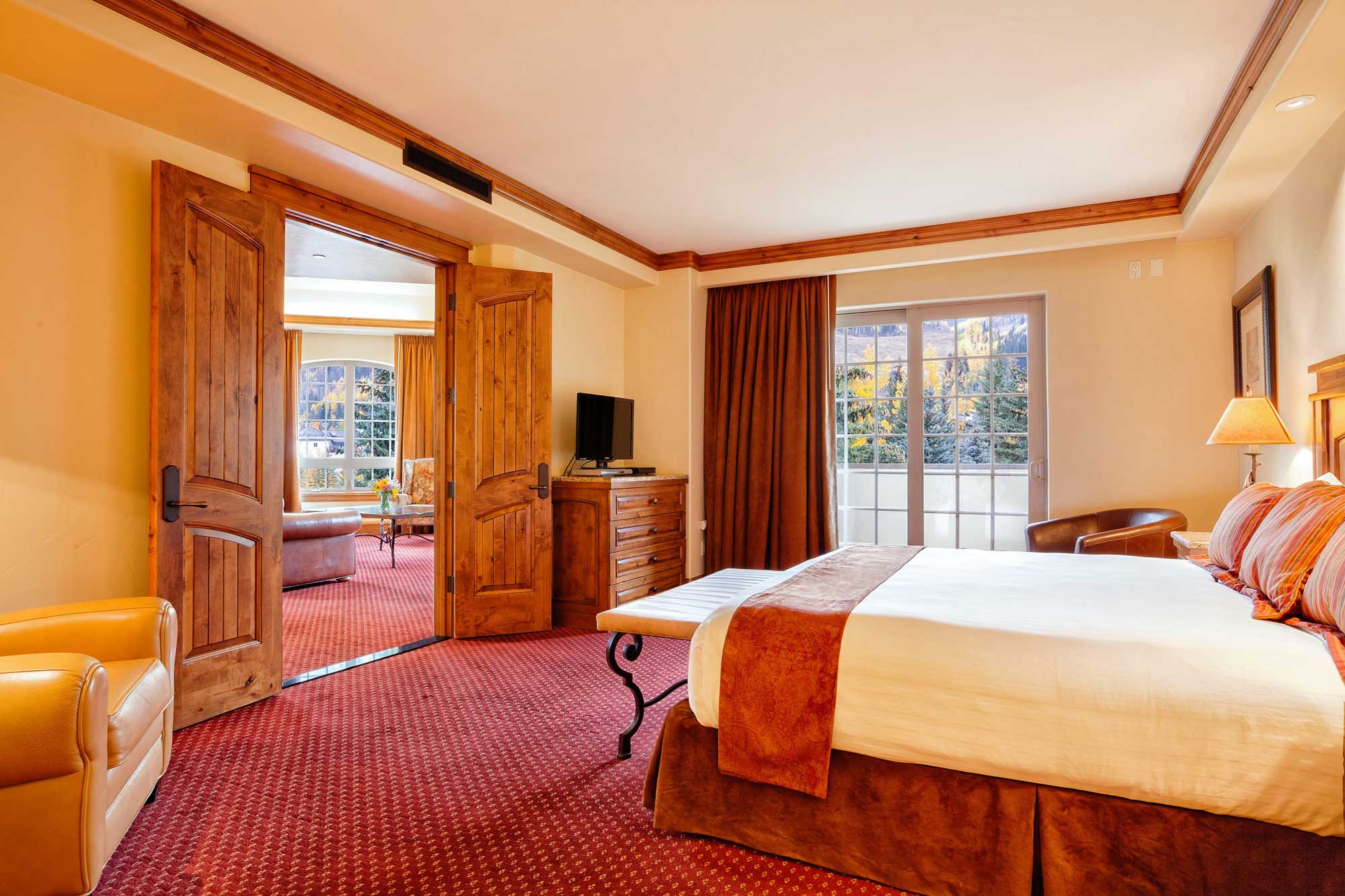 Seibert suite decorated Colorado style with large bedroom Tivoli Lodge Vail Colorado