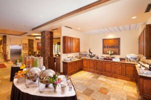 lobby converts to breakfast buffet in the morning at Tivoli Lodge Vail Colorado