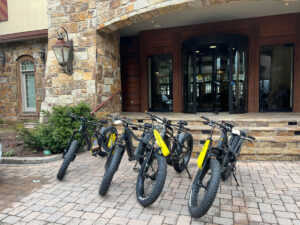 Quietkat electric bikes outside lobby ready for riders Tivoli Lodge Vail Colorado