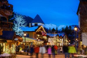 nightlife in Vail village with photo of blurry patrons and clear buildings Tivoli Lodge Vail Colorado