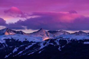 Vail in winter at sunset with pink and purple sky Tivoli Lodge Vail Colorado
