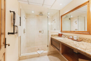 large shower and countertop in guest bathroom Tivoli Lodge Vail Colorado