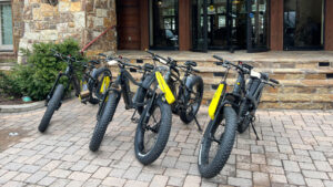 electric bikes are ready to go in front of the Tivoli Lodge Vail Colorado